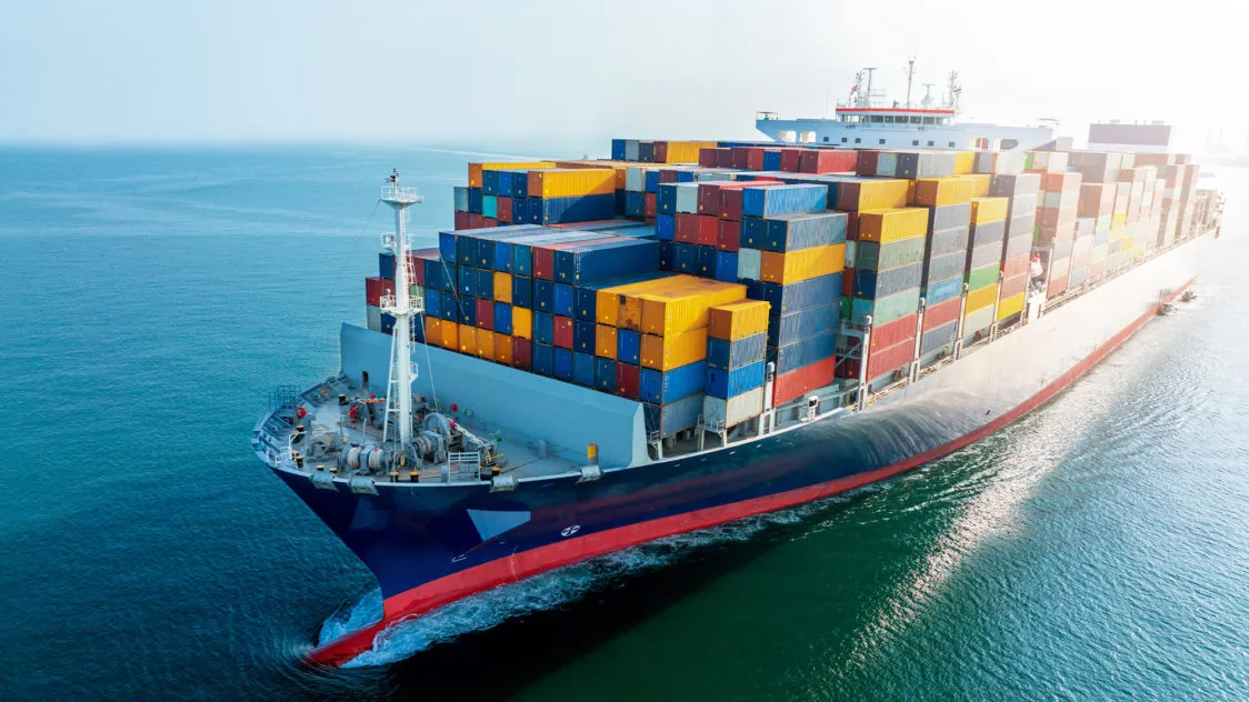 A container ship loaded with containers at sea